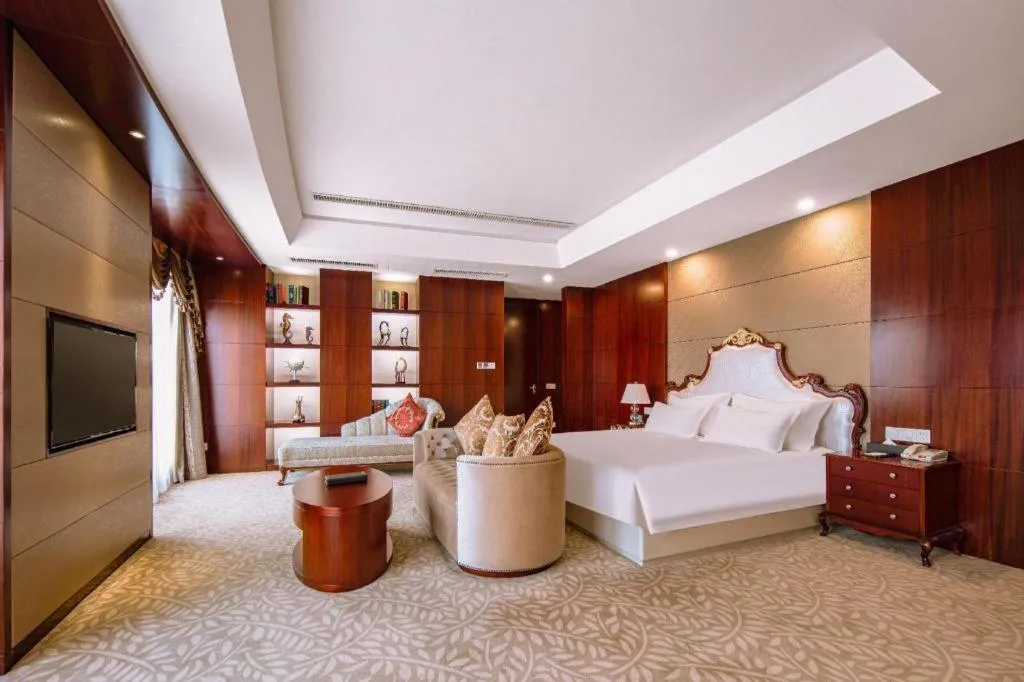 Bed in New Century Hotel Putuo Zhoushan