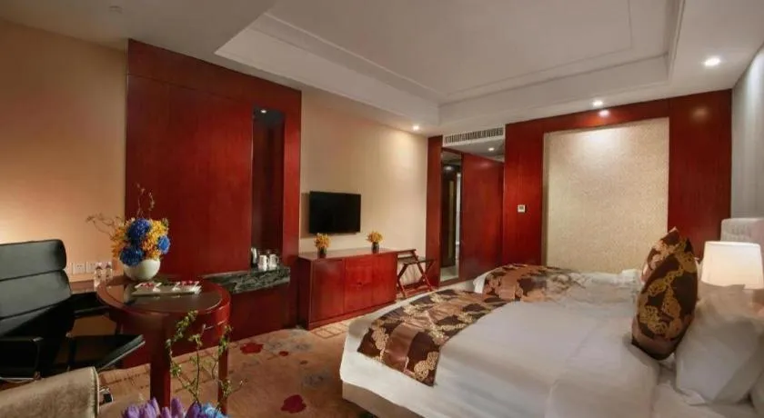 Bed in New Century Hotel Putuo Zhoushan