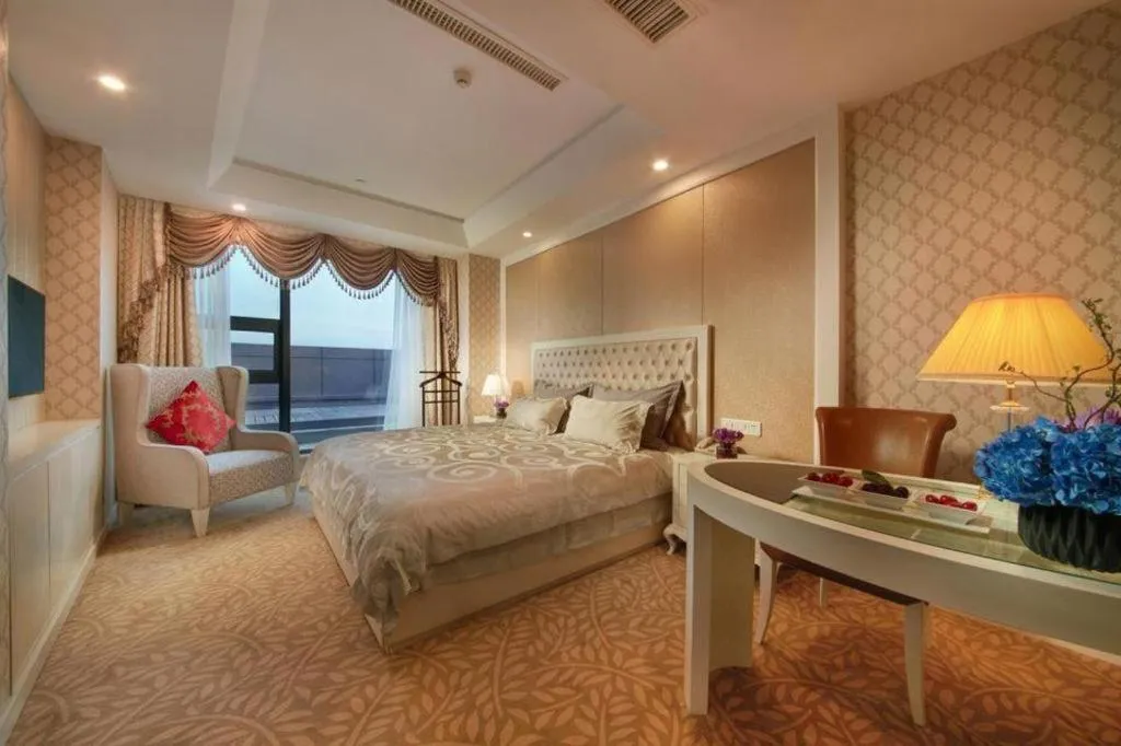 Bed in New Century Hotel Putuo Zhoushan