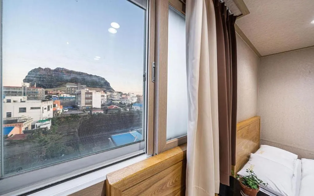 Bed in Seogwipo (Seongsan) Beach Hotel