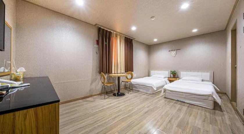 Bed in Seogwipo (Seongsan) Beach Hotel