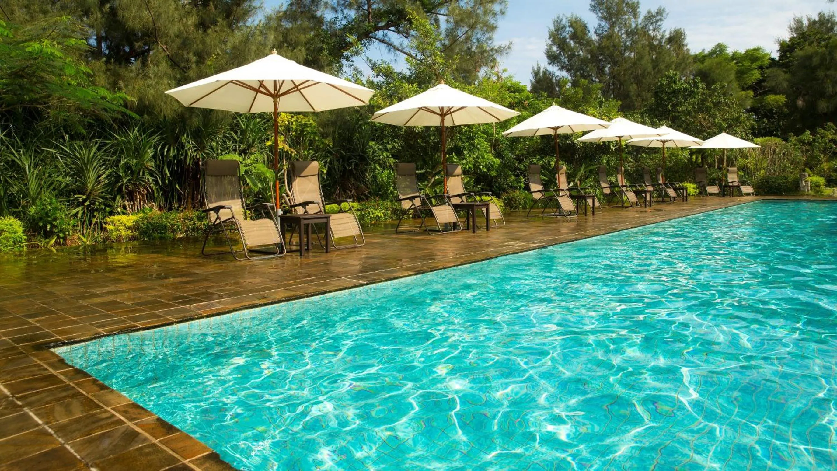 Swimming pool in Iriomote Hotel by Hoshino Resorts