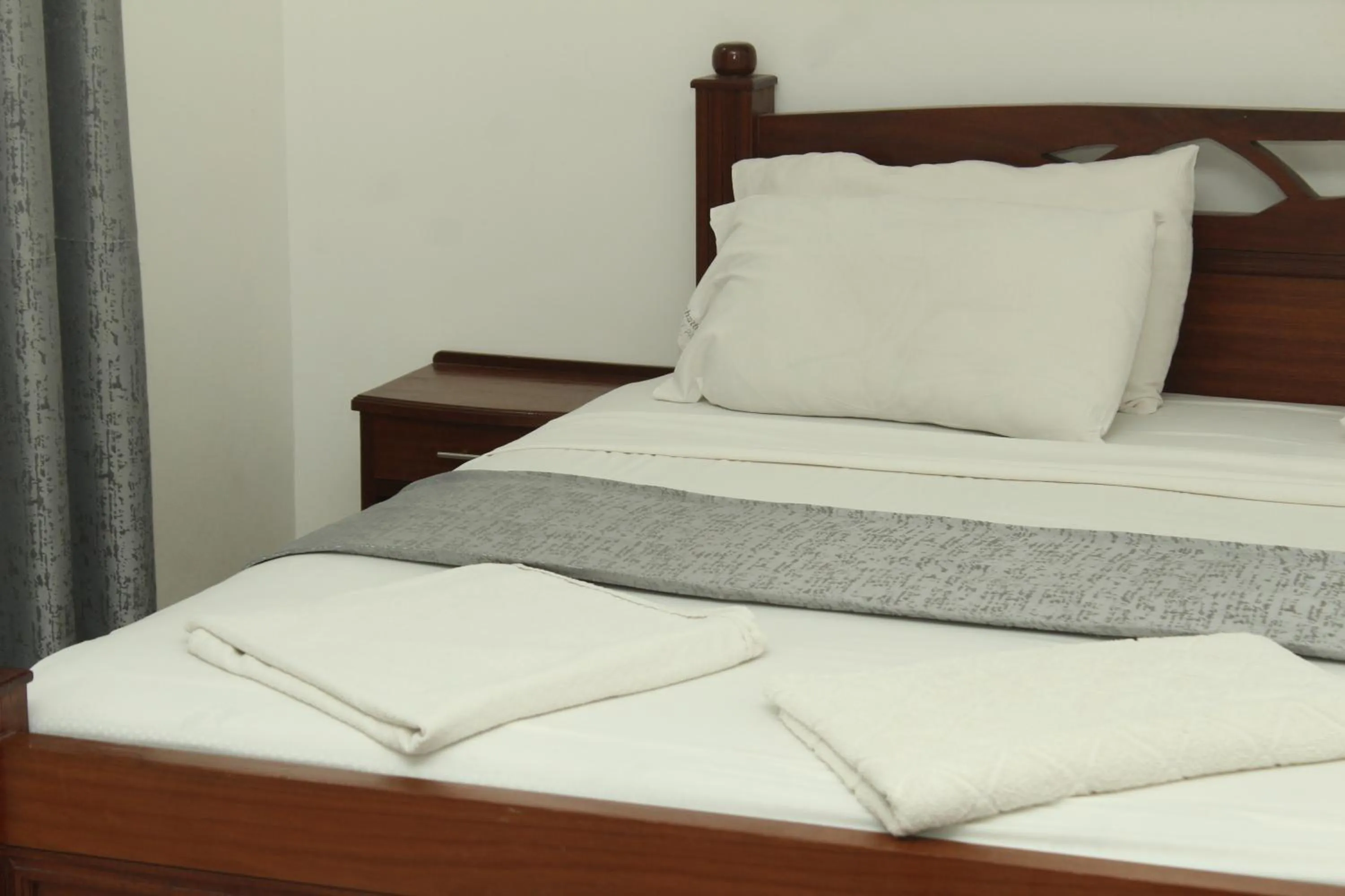 Bed in Regency Park Hotel