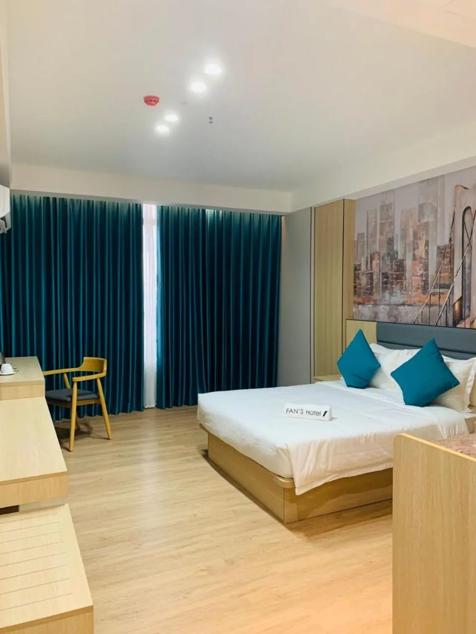 Bed in Fan's Hotel Palo