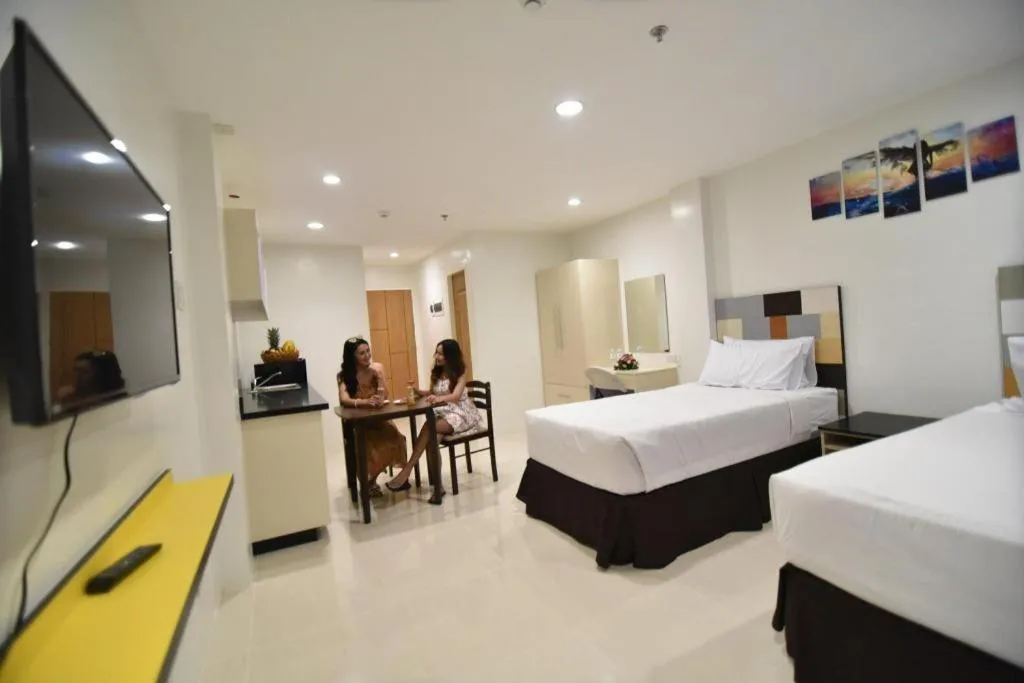 Bed in Holiday Oceanview Residences and Resort