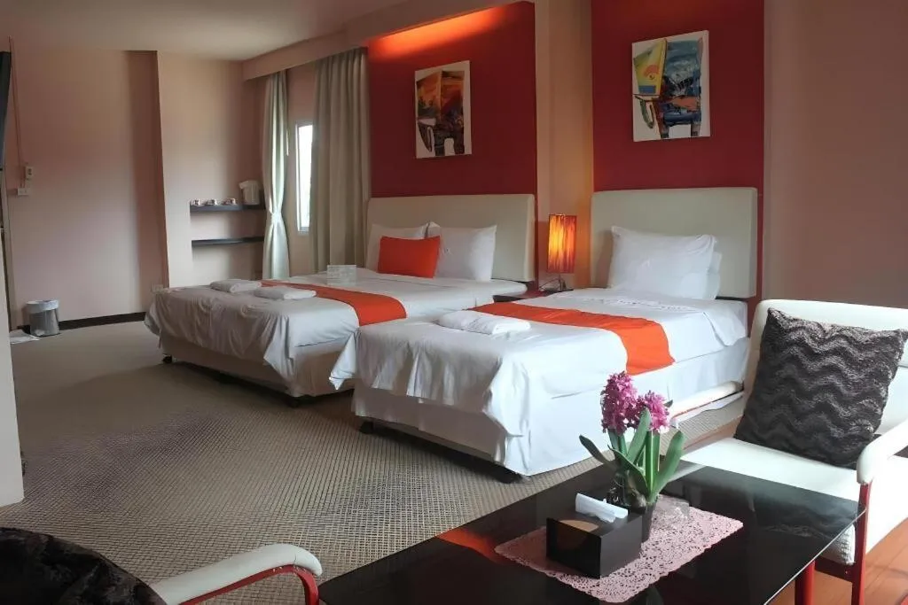 Bed in Cactus Resort & Hotel