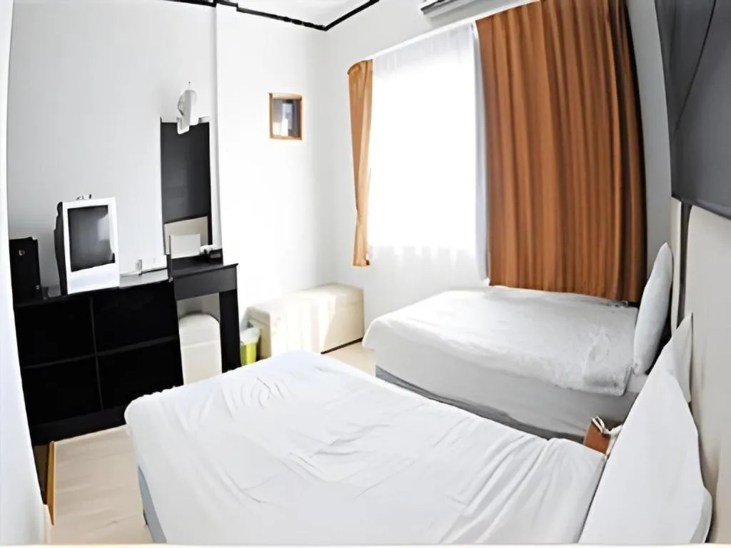 Bed in Cactus Resort & Hotel