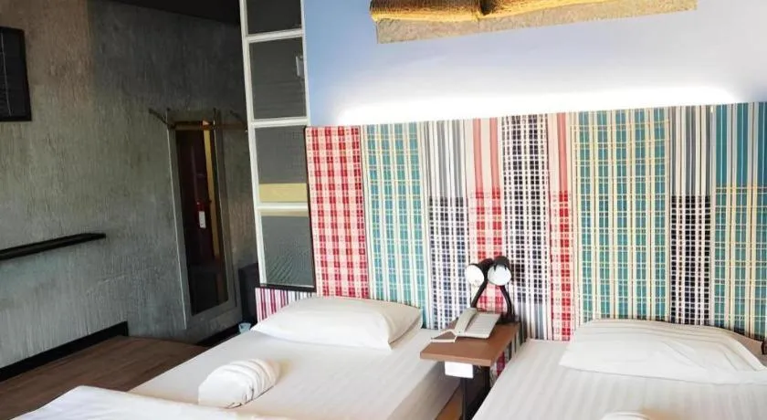 Bed in Cactus Resort & Hotel