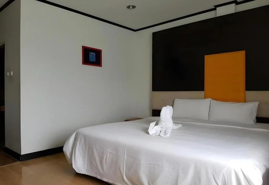 Bed in Cactus Resort & Hotel