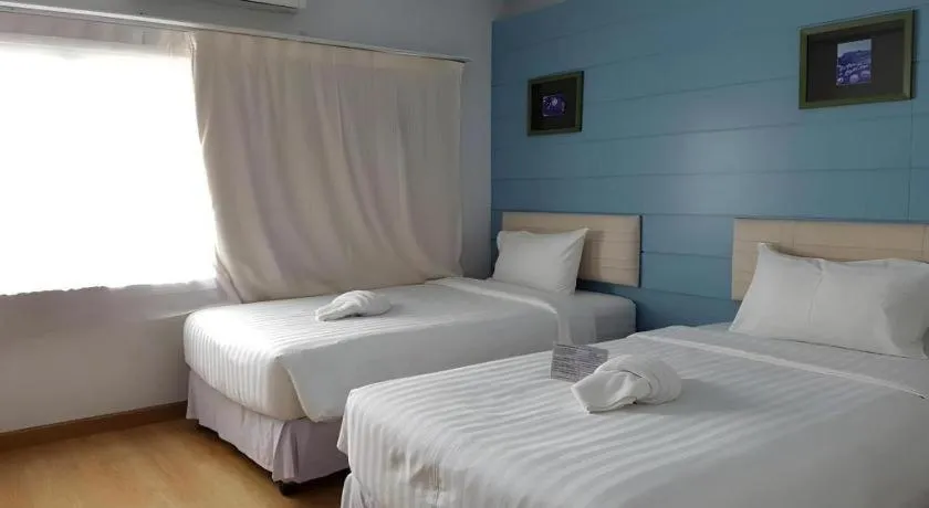 Bed in Cactus Resort & Hotel