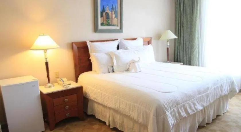 Bed in Hotel Honduras Maya