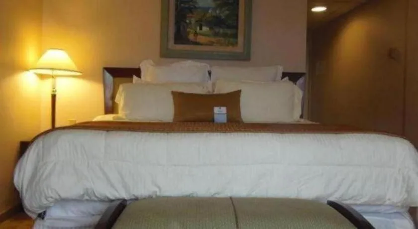 Bed in Hotel Honduras Maya