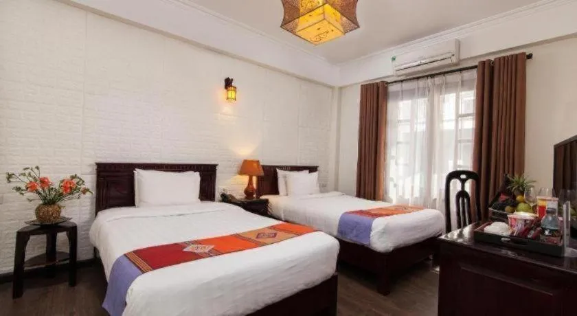 Bed in Chapa Dew Boutique Hotel