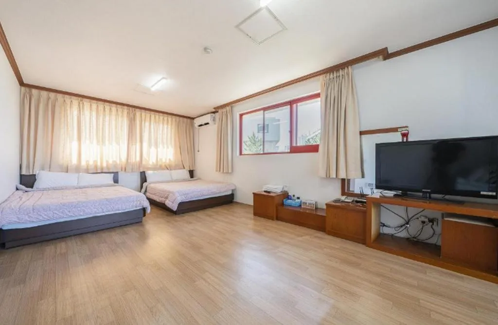 Bed in Gangneung Gyeongpodae Gangneung Motel
