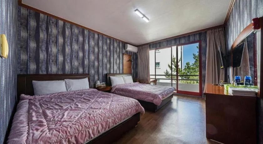 Bed in Gangneung Gyeongpodae Gangneung Motel