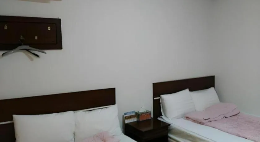 Bed in Gangneung Gyeongpodae Gangneung Motel