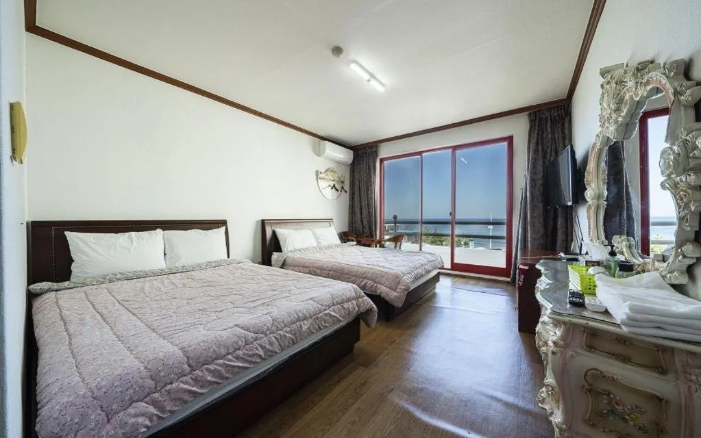 Bed in Gangneung Gyeongpodae Gangneung Motel