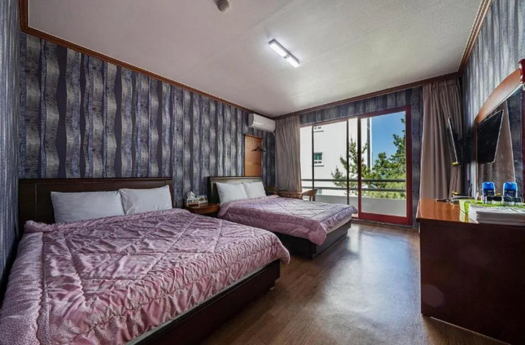 Bed in Gangneung Gyeongpodae Gangneung Motel