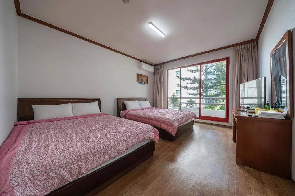 Bed in Gangneung Gyeongpodae Gangneung Motel