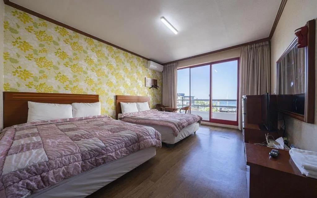 Bed in Gangneung Gyeongpodae Gangneung Motel