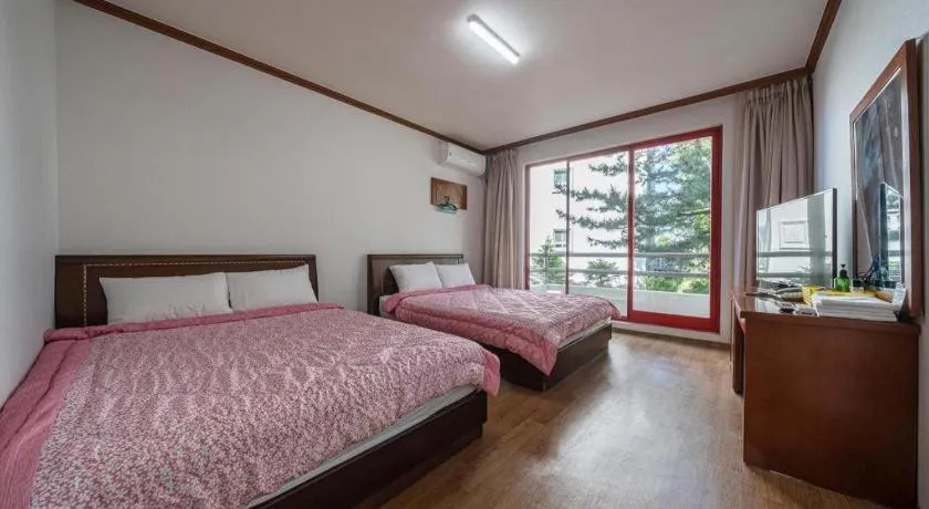 Bed in Gangneung Gyeongpodae Gangneung Motel