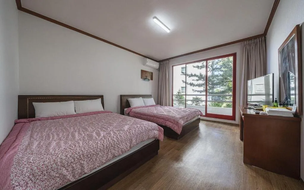 Bed in Gangneung Gyeongpodae Gangneung Motel