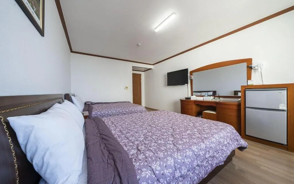 Bed in Gangneung Gyeongpodae Gangneung Motel