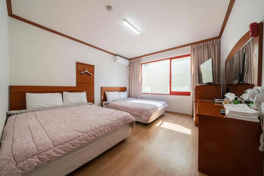 Bed in Gangneung Gyeongpodae Gangneung Motel