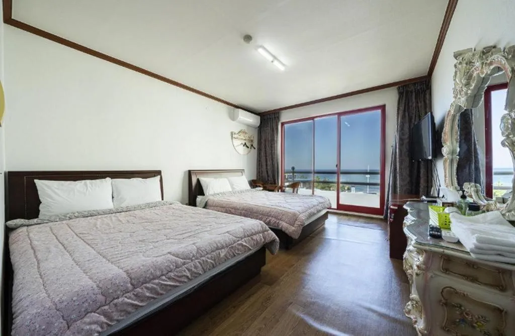 Bed in Gangneung Gyeongpodae Gangneung Motel