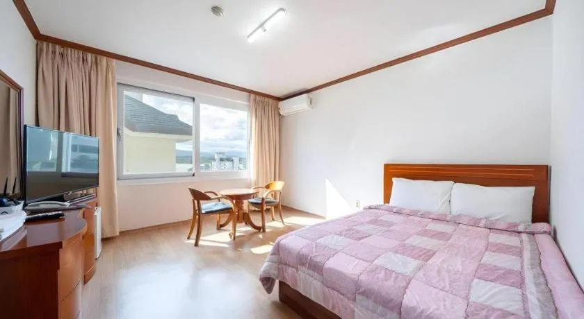 Bed in Gangneung Gyeongpodae Gangneung Motel