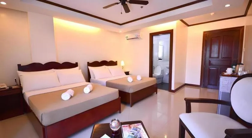 Bed in Ipil Suites Puerto Princesa