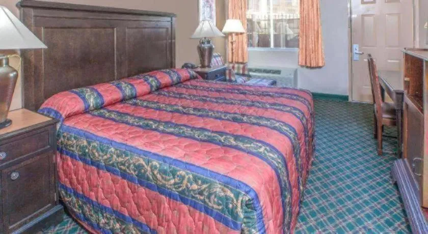 Bed in Knights Inn - Forest Hill, TX