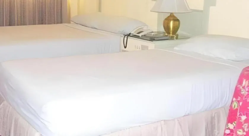 Bed in Cebu Northwinds Hotel