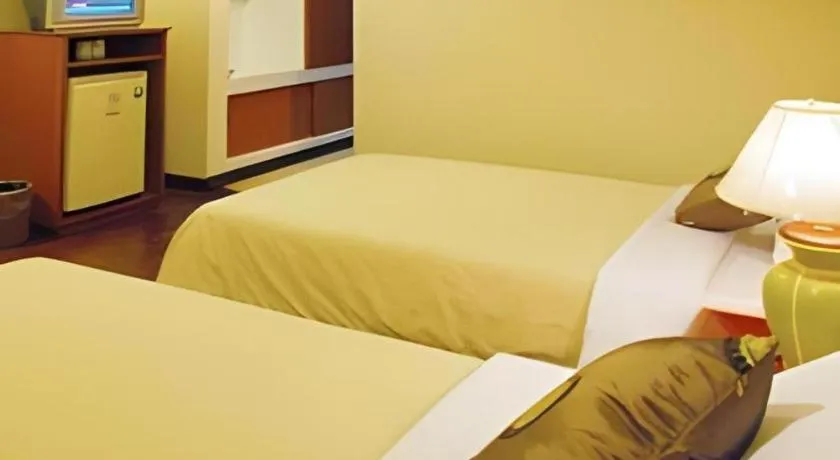 Bed in Ubon Hotel