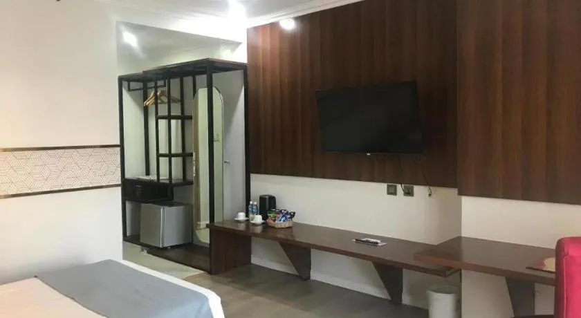 Bed in Queen Margarette Hotel