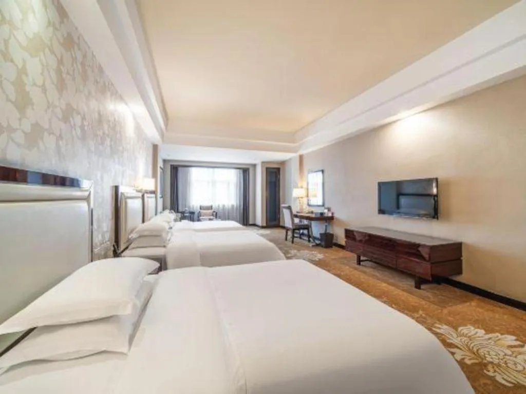 Bed in Country Garden Phoenix Hotel Yunfu