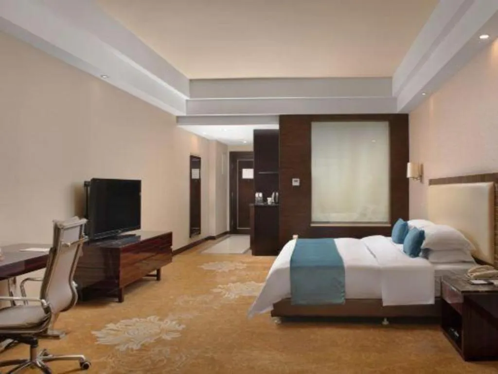 Bed in Country Garden Phoenix Hotel Yunfu