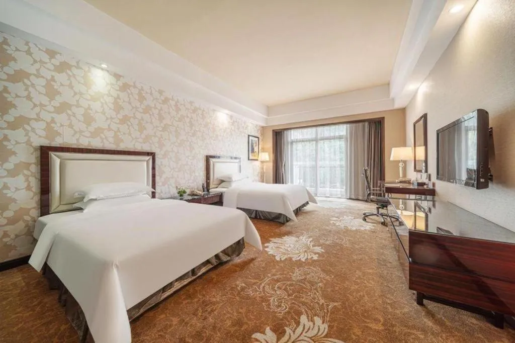 Bed in Country Garden Phoenix Hotel Yunfu