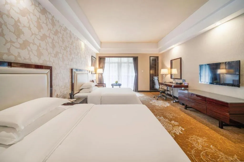 Bed in Country Garden Phoenix Hotel Yunfu