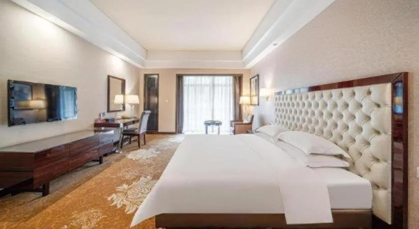 Bed in Country Garden Phoenix Hotel Yunfu