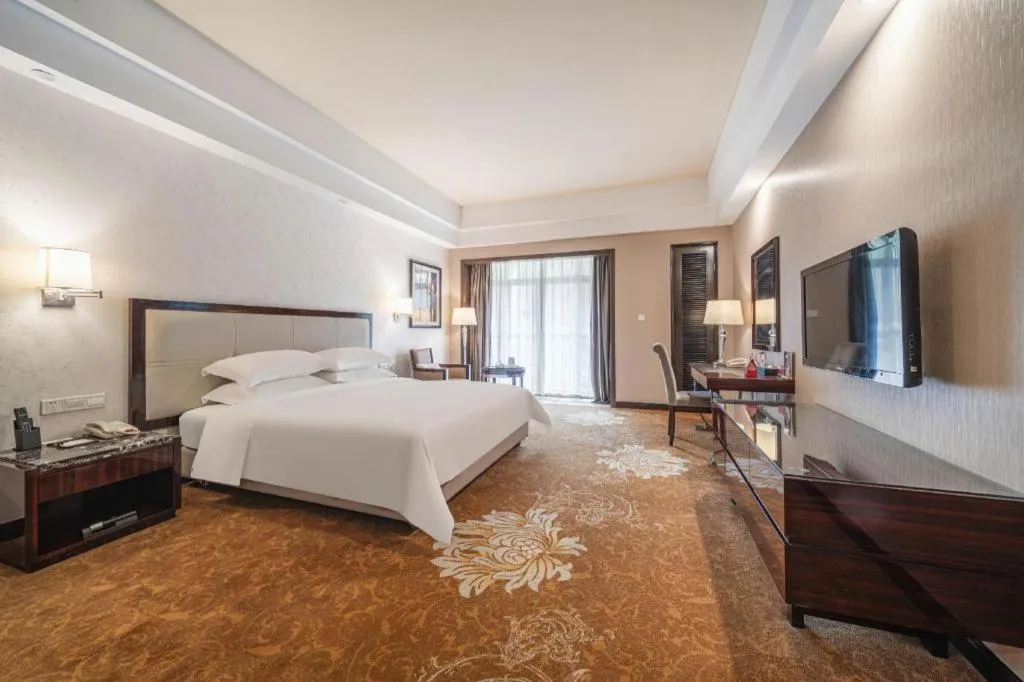 Bed in Country Garden Phoenix Hotel Yunfu