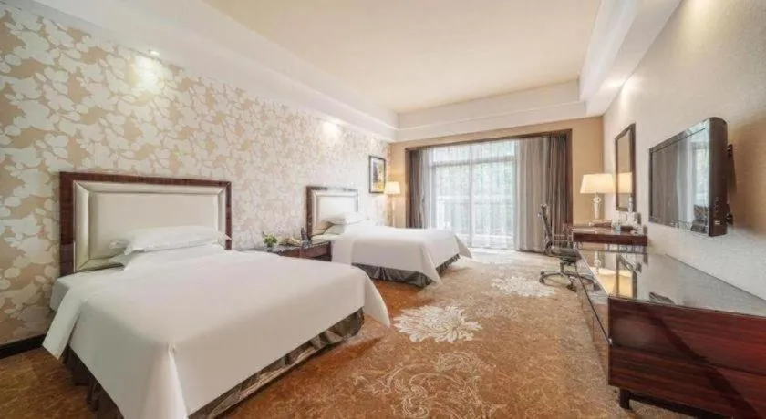 Bed in Country Garden Phoenix Hotel Yunfu