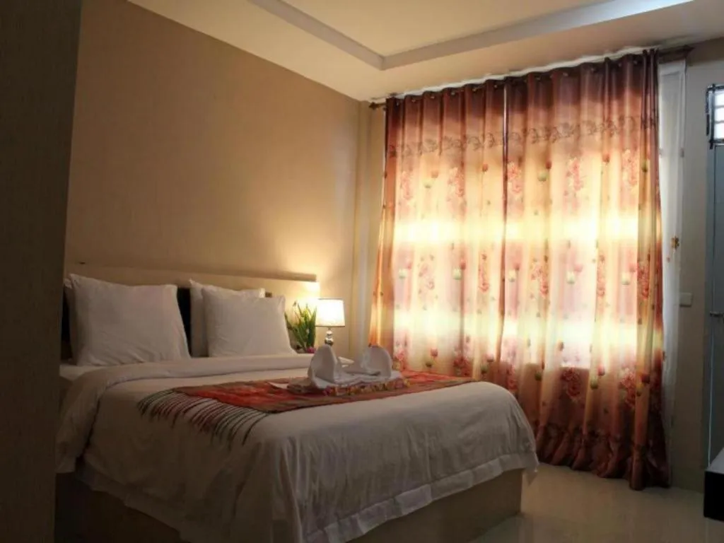 Bed in Samosir Cottages Resort