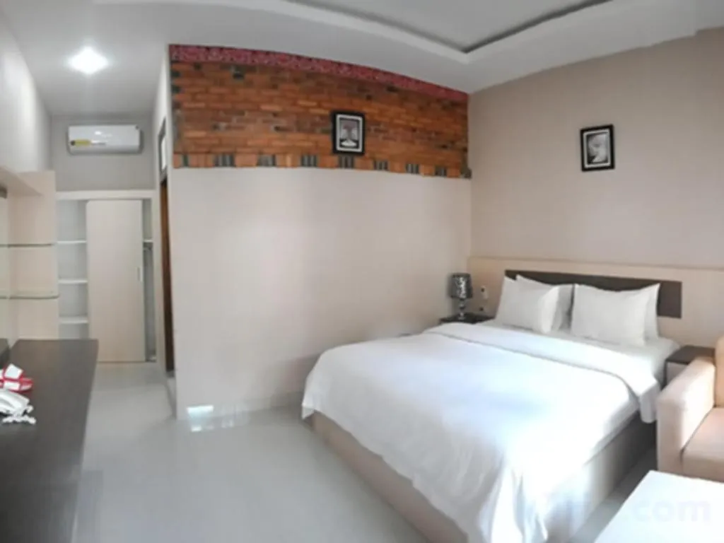 Bed in Samosir Cottages Resort