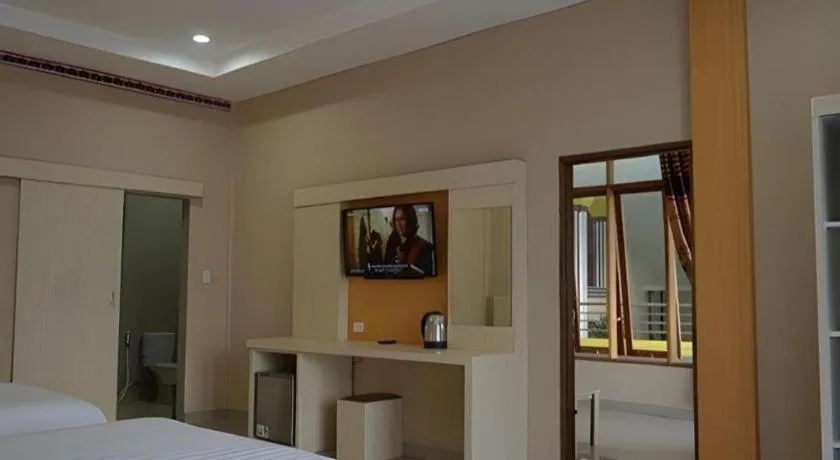 Bed in Samosir Cottages Resort