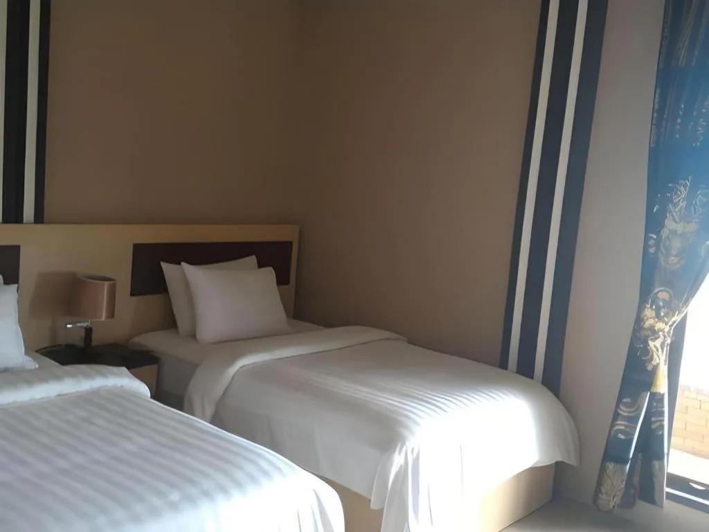 Bed in Samosir Cottages Resort