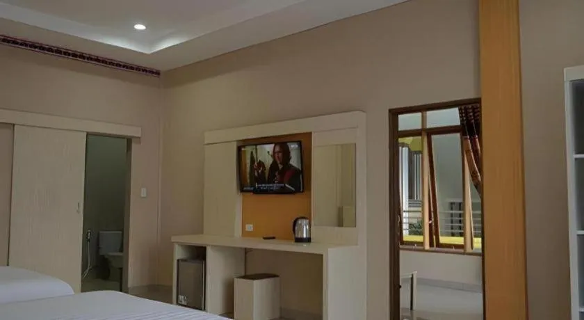 Bed in Samosir Cottages Resort