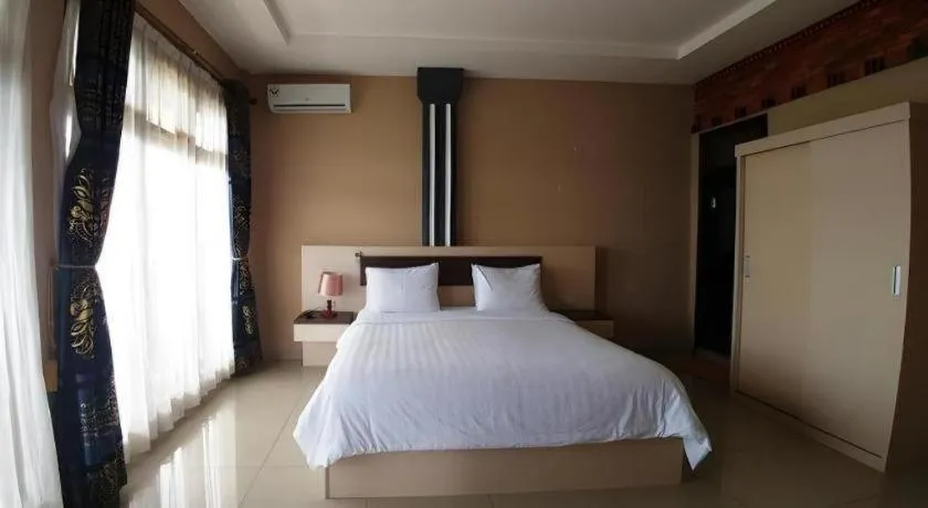 Bed in Samosir Cottages Resort