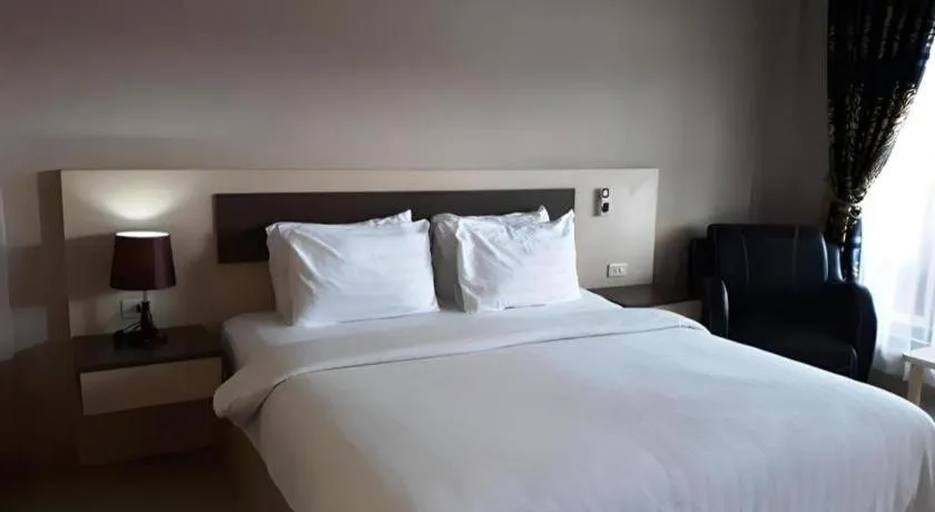 Bed in Samosir Cottages Resort