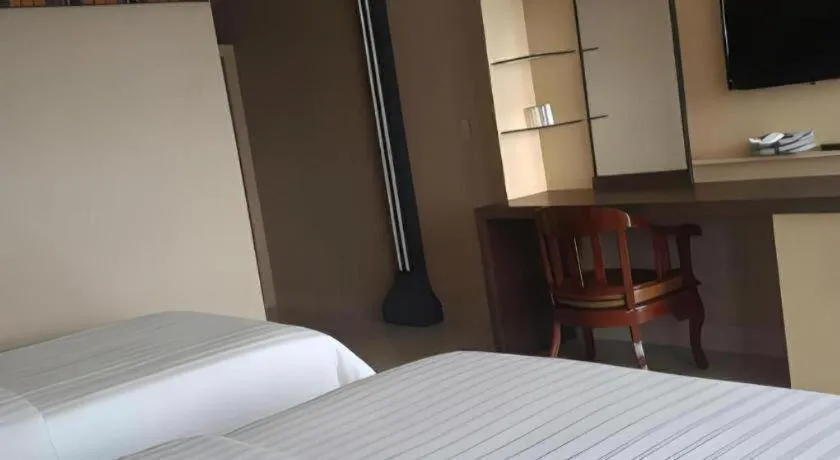 Bed in Samosir Cottages Resort